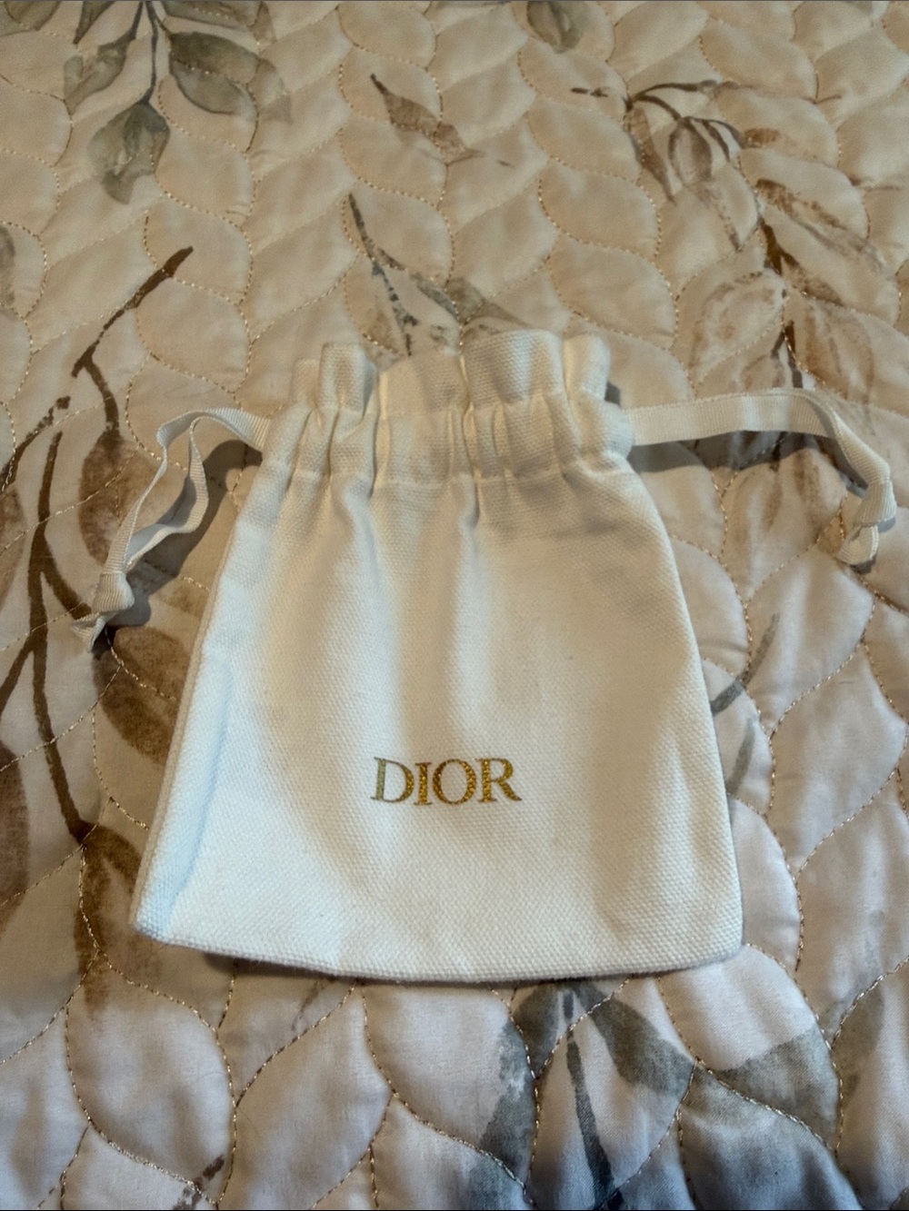 White Dior canvas pouch